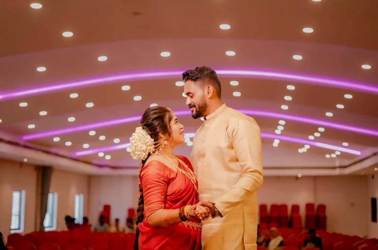 Couple enjoying their wedding moments beautifully organized by Lights of Love, a leading event management company in Palakkad, specializing in elegant wedding planning and celebrations.